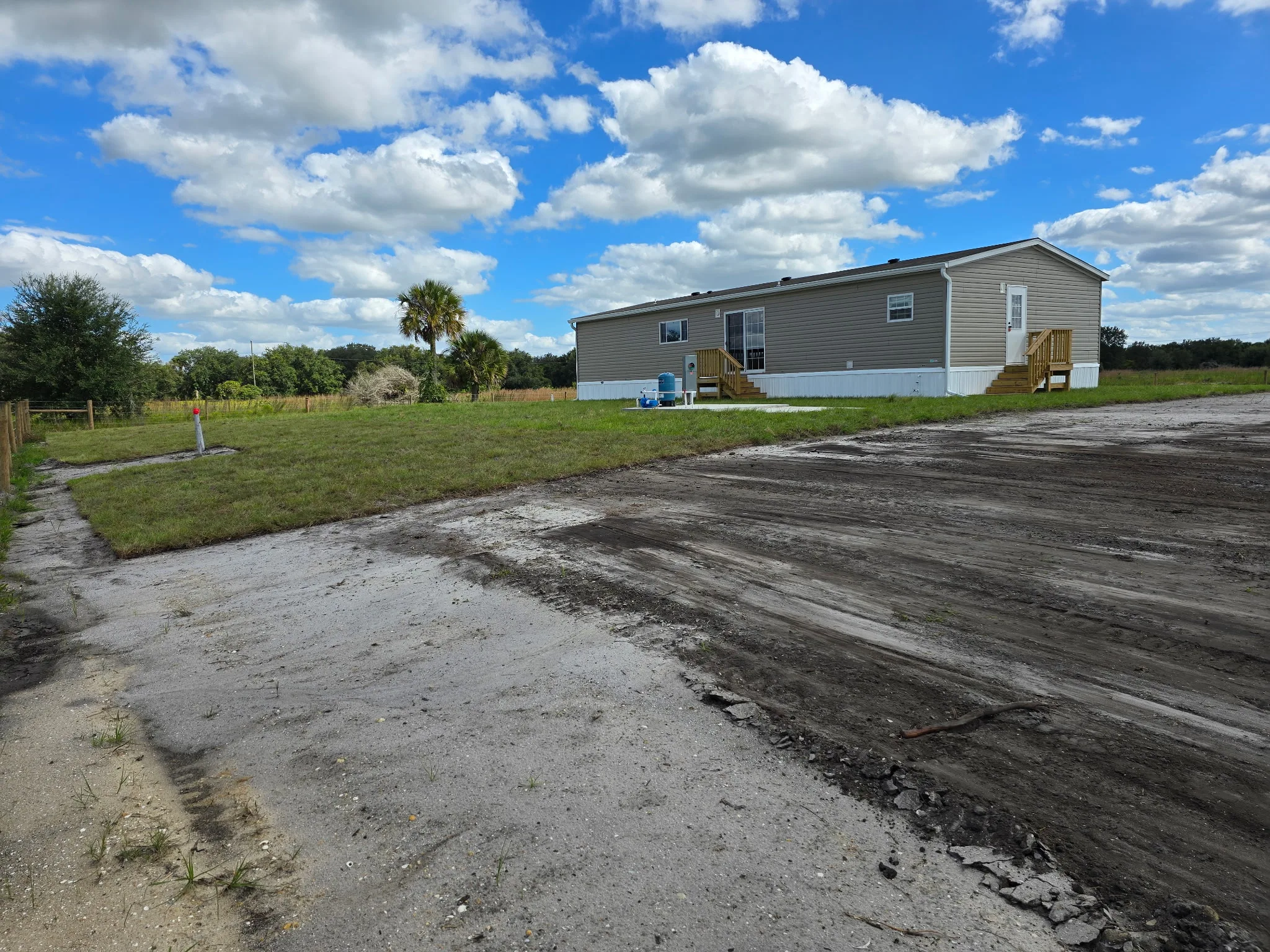 Prepared house pad and site work for a residential property.